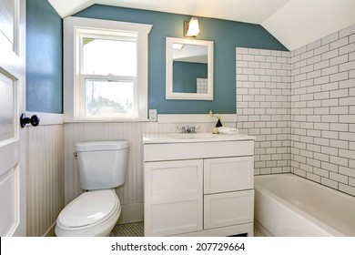 Bathroom Interior With Tile And Plank Wall Trim