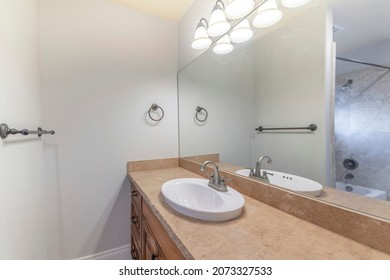 Bathroom Interior With Vanity Sink And Towel Bar Holder