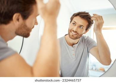 Bathroom, mirror reflection and happy man with hair care routine for maintenance, beauty process or hygiene cleaning treatment. Smile, morning and home person style locks for clean shampoo hairstyle - Powered by Shutterstock