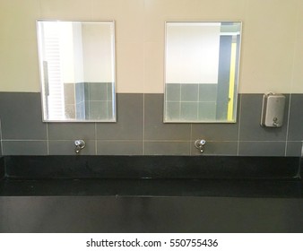 Bathroom At Office. Handbasin And Mirror In Toilet