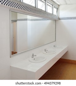 Bathroom At Office.Handbasin And Mirror In Toilet