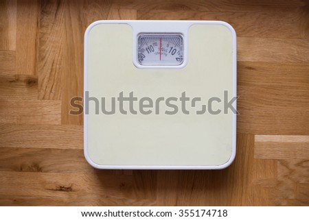 bathroom scale - diet and overweight concept