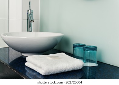 Bathroom Sink Counter Towels Water Glass Blue