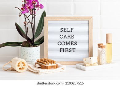 Bathroom Styling And Organization. Letter Board With Text Self Care Comes First. Organic Lifestyle And Skin Care Products. 