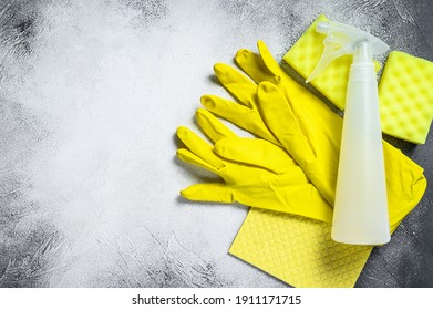 Bathroom and toilet yellow cleaning concept, housecleaning, hygiene, spring, chores, cleaning supplies. White background. Top view. Copy space