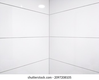 The bathroom walls with white tiles background - Shutterstock ID 2097208105
