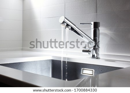 Bathroom water mixer. Water tap made of chrome material