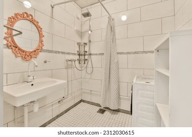 a bathroom with white tile and black and white tiles on the walls there is a sink, toilet, mirror and shower - Shutterstock ID 2312030615