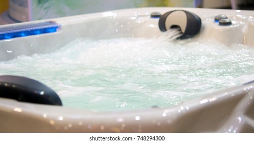 bathtub-filled-water-waterfall-jet-260nw-748294300.jpg