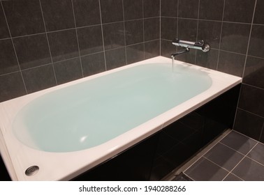 Bathtub with overflowing hot water