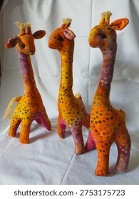 A batik patchwork doll is a handmade toy created from pieces of colorful batik fabric. It reflects traditional Indonesian craftsmanship and creativity in recycling fabric scraps. These dolls are unique, decorative, and often used as toys, souvenirs, or cultural crafts.