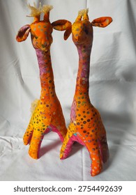 A batik patchwork doll is a handmade toy crafted from pieces of batik fabric. It reflects traditional Indonesian artistry and creative use of fabric scraps. These dolls are unique, colorful, and often used as toys, decorations, or cultural souvenirs.