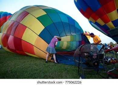 Baton Rouge, Louisiana, USA - 2010: People Prepare For The Glowing Of The Balloons At The Annual Hot Air Balloon Festival