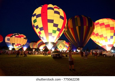 Baton Rouge, Louisiana, USA - 2010: People Prepare For The Glowing Of The Balloons At The Annual Hot Air Balloon Festival