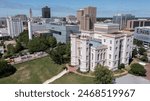 Baton Rouge, Louisiana, USA - April 21, 2024: Afternoon sun shines on the historic skyscrapers of the downtown Baton Rouge skyline.