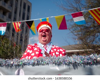 Baton Rouge, Louisiana, USA -  February 2019: People Celebrate During An Annual Mardi Gras Parade In The Spanish Town District.