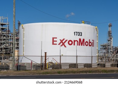 Baton Rouge, Louisiana, USA - February 13, 2022: The ExxonMobil sign on the oil tank. ExxonMobil, is an American multinational oil and gas corporation. 