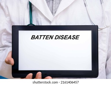 Batten Disease.  Doctor With Rare Or Orphan Disease Text On Tablet Screen Batten Disease