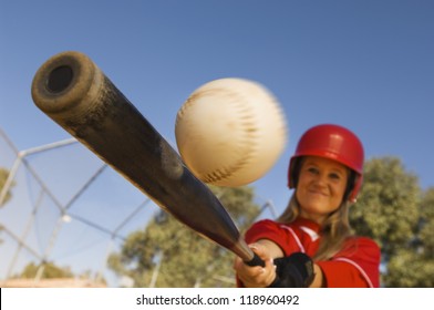 Batter Hitting Softball