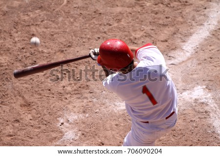 Batter takes a big swing at a fastball