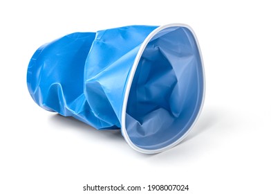 A Battered Blue Plastic Cup, Insulated On A White Background