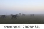 A battery at the angle at Gettysburg. This foggy morning made for an eerie photo with the Philadelphia Brigade monuments shadowed in the background. 