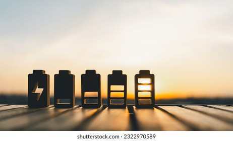 Battery charge indicator wood model. Phone charge level. Concepts of battery charge indicators through mesmerizing photographs. Unleash the power, technology, and innovation of these digital icons. - Shutterstock ID 2322970589