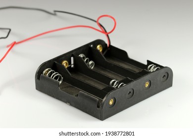 Battery holder AA. Holder for four batteries. Electronic components.