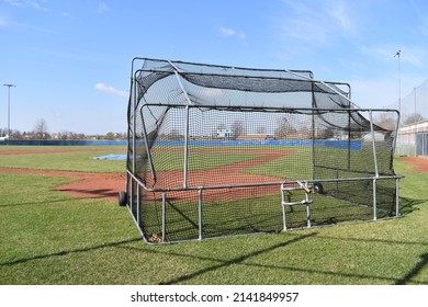 Batting Cage On A Baseball Field