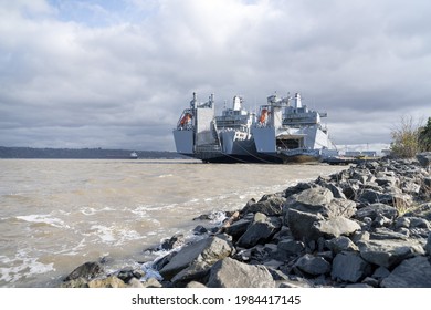 A Battleship On The Tacoma Port With Dirty Sea Waters