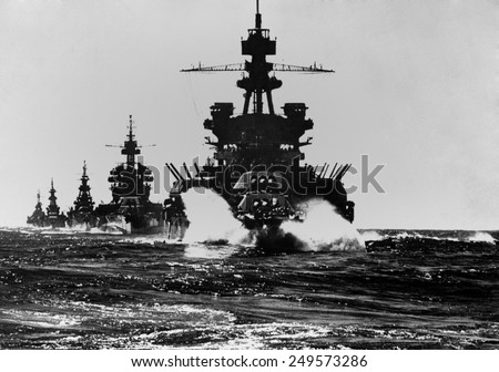 Battleship USS Pennsylvania is followed by three cruisers. They enter the Lingayen Gulf to support the U.S. Invasion of Luzon Island. Jan. 1945. Philippines, Pacific Ocean, World War 2.