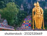 Batu Caves, Kuala Lumpur, July 21, 2023: New view with colourful staircase at Murugan Temple Batu Caves has become a new tourist attraction in Malaysia. This was on a hot, humid, afternoon in Malaysia