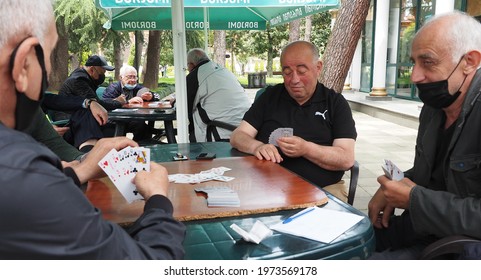 Batumi, Adjara, Georgia 05-04-2021: Older Men Playing Cards In Veterans Club In The Seaside Park Of The Old Batumi District