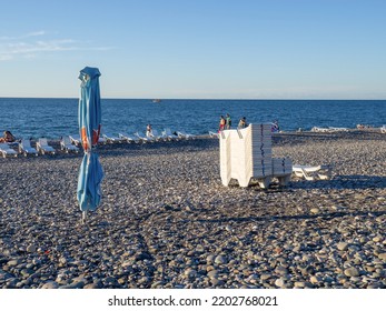 Batumi, Georgia. 09.09.2022 Beach Beds. Folded Beds. End Of The Season. On The Sunset. Beach Vacation. Resort By The Sea.