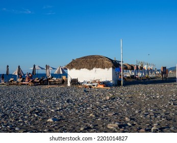 Batumi, Georgia. 09.09.2022 Beach Vacation. Resort By The Sea. Beach View. Tents And Stalls On The Beach.
