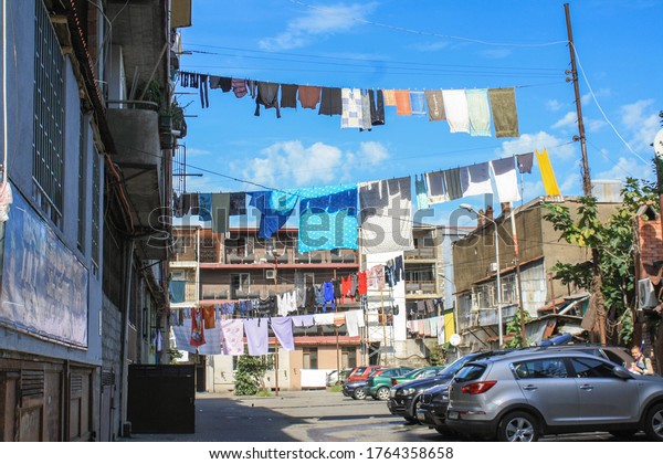 Batumi, Georgia - 2020: linen, clothes are dried on\
the clothesline in the\
yard