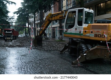 Batumi, Georgia - July 11, 2022: Excavator Removes Paving Stones