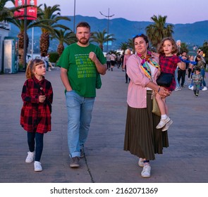 Batumi, Georgia - May 26, 2022: Slavic Family On A Walk