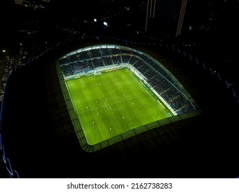 Batumi, Georgia - May 8 2022: Picture From A Drone Of The New Stadium In Batumi. Night View From A Drone On A Football Field With Players During A Match