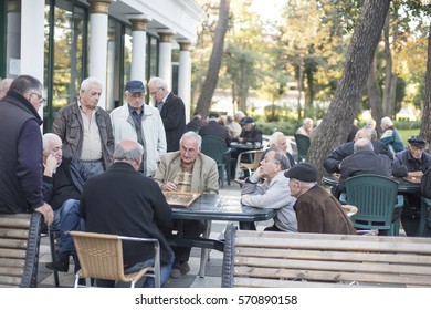 BATUMI, GEORGIA - NOVEMBER 10: Unidentified Elderly Men Play Outdoor Backgammon And Chess In City Chess Club Of Batumi, Georgia, November 10, 2016. Most Of Chess Club Members Are Retired People.