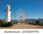 Batumi Lighthouse and Ferris Wheel on a Sunny Day in Georgia