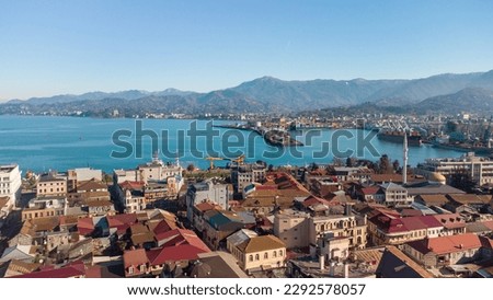 Batumi seaport from a height on a sunny day.Seaport against the backdrop of mountains.Panoramic view of Batumi and the Black Sea.Photos of the city of Batumi from above,Georgia,Mountain Adjara,
