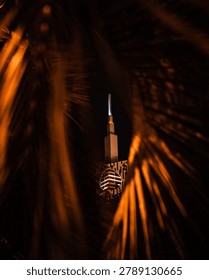 Batumi Tower at night with dramatic light trails and illuminated structure in Georgia cityscape