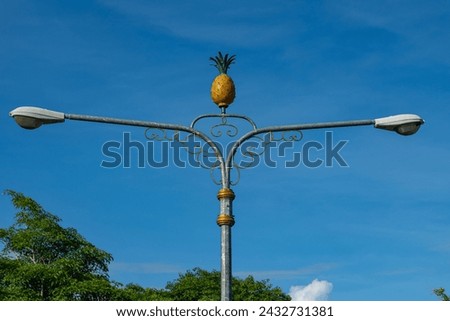 Baubau, Indonesia -March 1, 2024 - Unique Pineapple Street Light Typical of Buton Area Under Clear Blue Sky