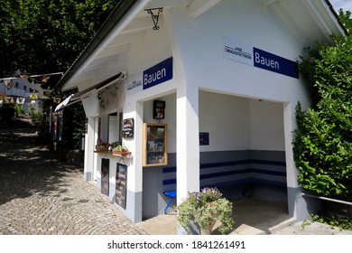 Bauen, Switzerland – August 27, 2020: There Is A Small Ticket Office Building Which Is Now Empty. There Is No People Neither Inside Nor Around.