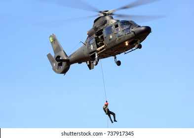 BAURU, BRAZIL - June 13, 2015 - Phanther Helicopter Simulating A Rappel Rescue.