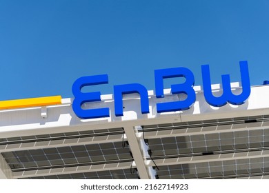 Bavaria, Germany, March 2022: EnBW Logo on a Supercharger station for a electric cars, battery charging station. Supercharger station from EnBW are a part of a expanding car charging network in german