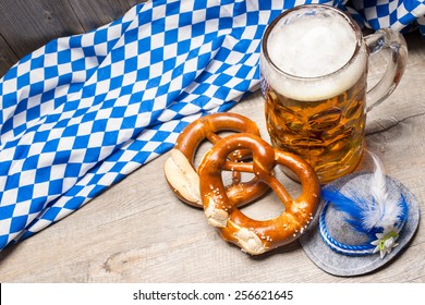 Bavarian Beer Mug And Pretzels On A Rustic Wooden Table