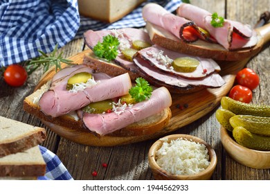 Bavarian snack with smoked country ham with freshly grated horseradish on hearty farmhouse bread - Shutterstock ID 1944562933