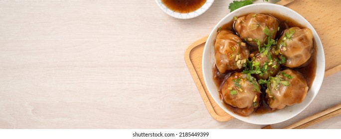 Bawan (Ba Wan), Taiwanese Meatball Delicacy, Delicious Street Food, Steamed Starch Wrapped Round Shaped Dumpling With Pork And Shrimp Inside And Thick Soy Sauce.